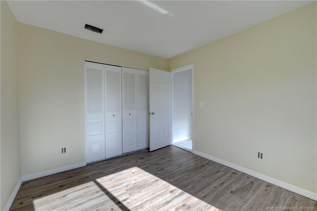 297 Southwest Homeland Road Port St. Lucie, FL 34953 - Photo 24 of 32 a view of an empty room