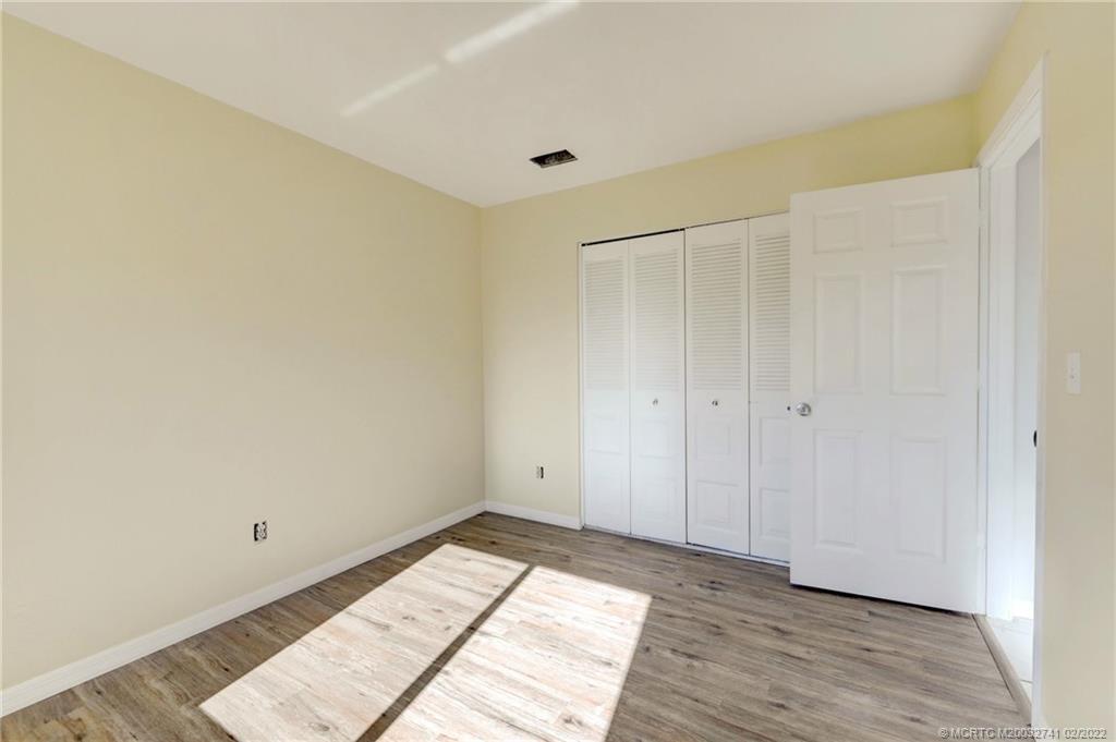 297 Southwest Homeland Road Port St. Lucie, FL 34953 - Photo 27 of 32 a view of an empty room