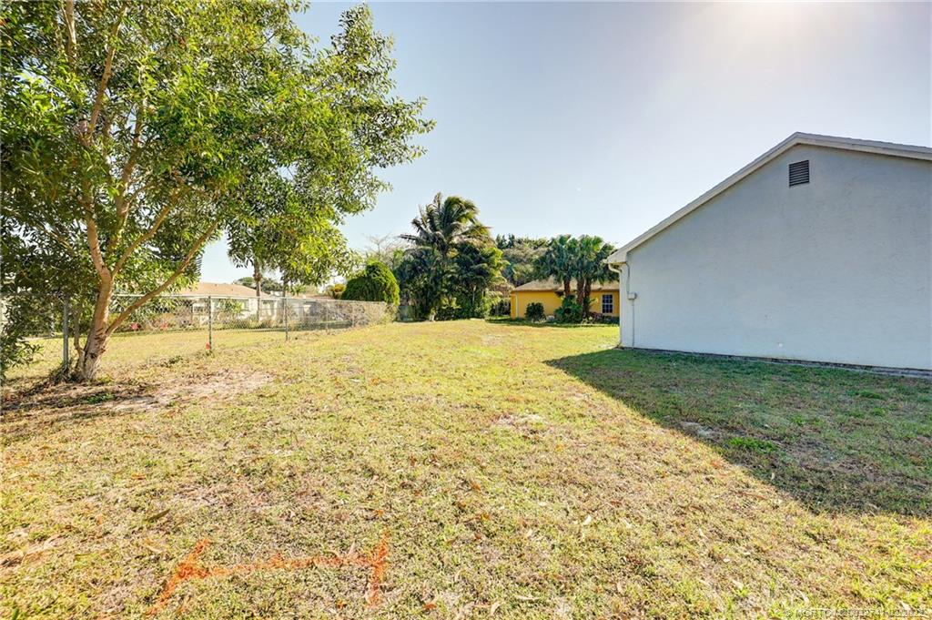 297 Southwest Homeland Road Port St. Lucie, FL 34953 - Photo 32 of 32 a view of back yard of the house