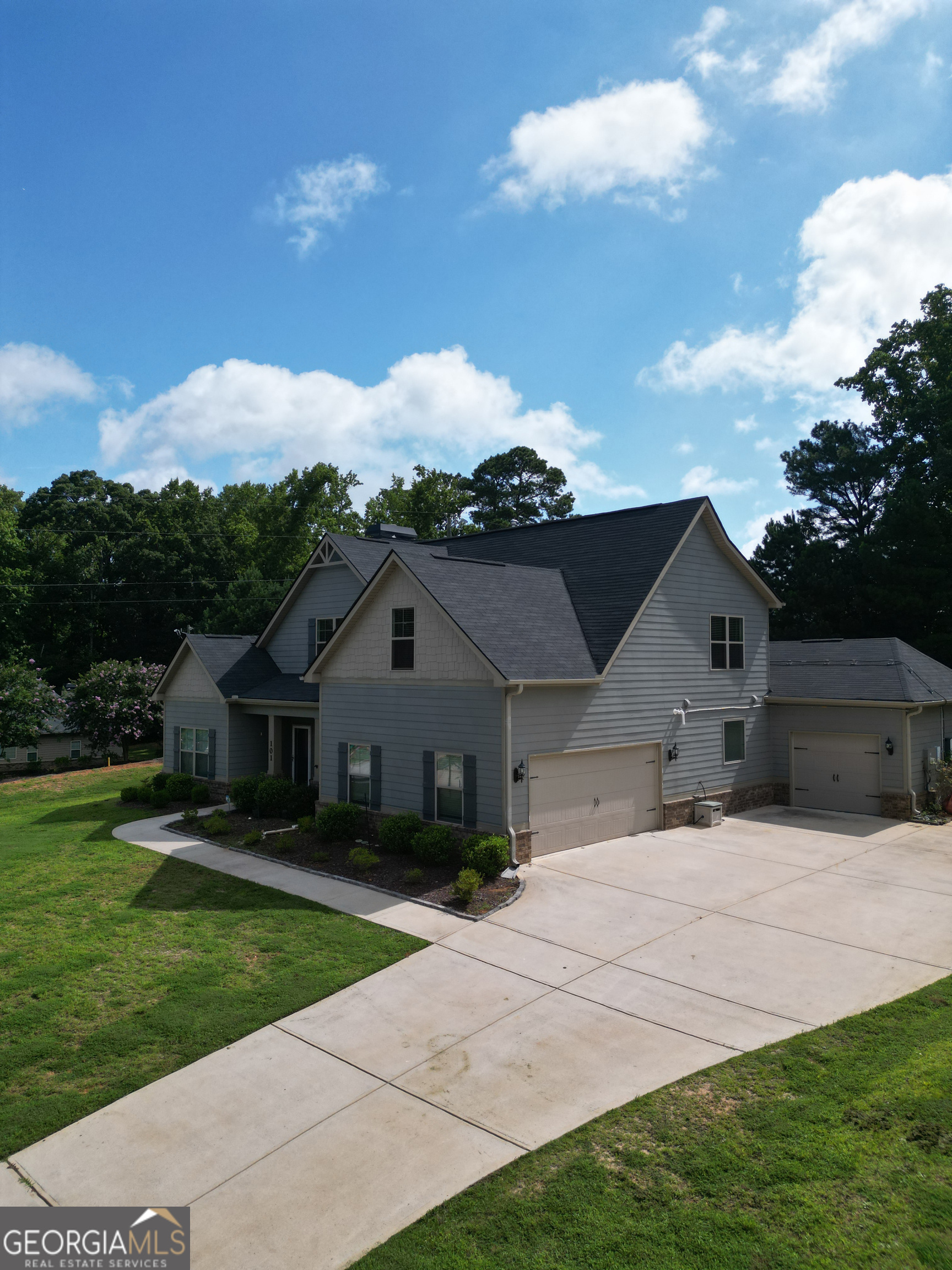101 Ruby Lane McDonough, GA 30252 - Photo 1 of 1 a front view of a house with a yard