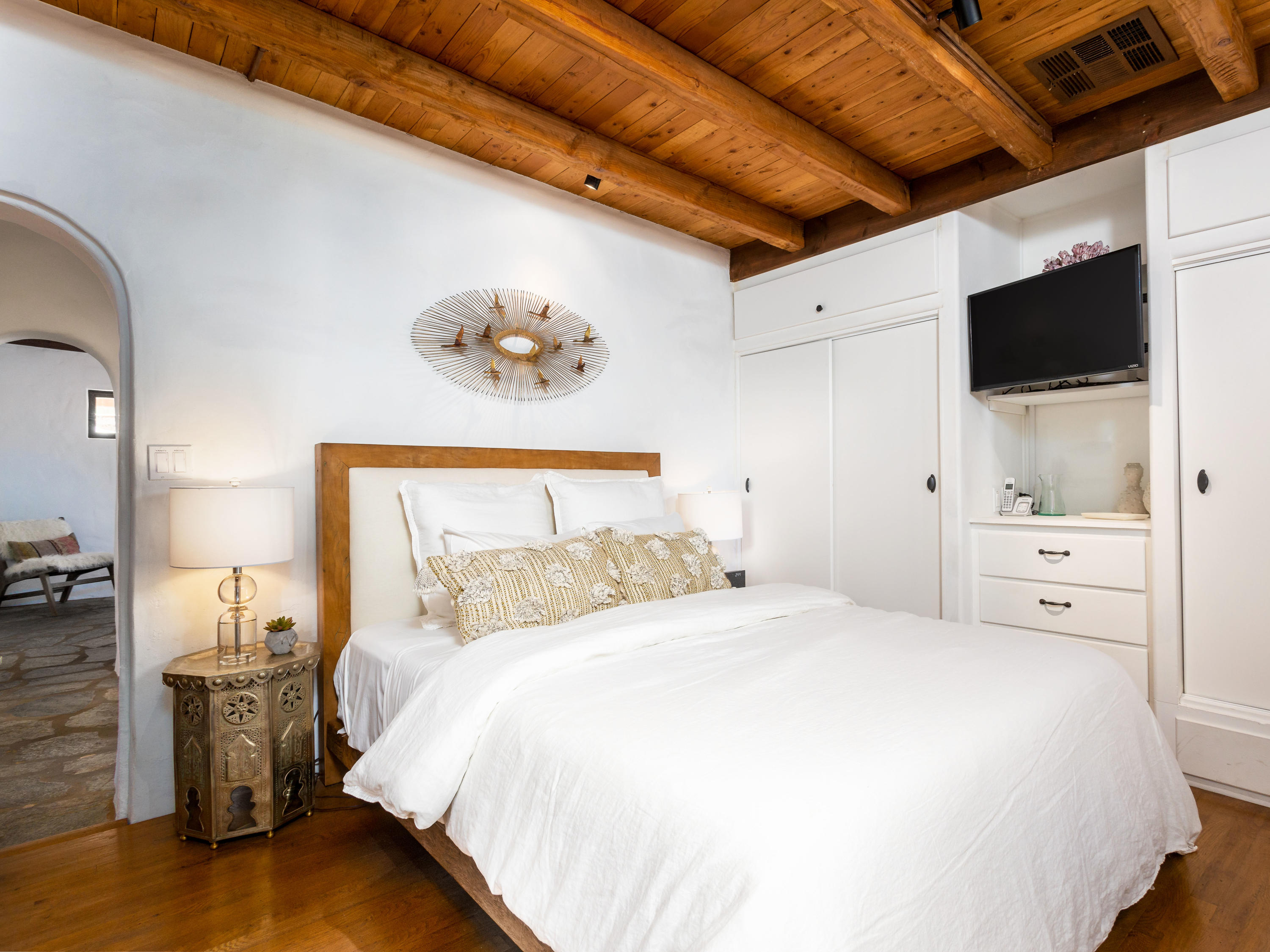 71607 Sahara Road Rancho Mirage, CA 92270 - Photo 24 of 40 a bedroom with a bed and a flat tv screen