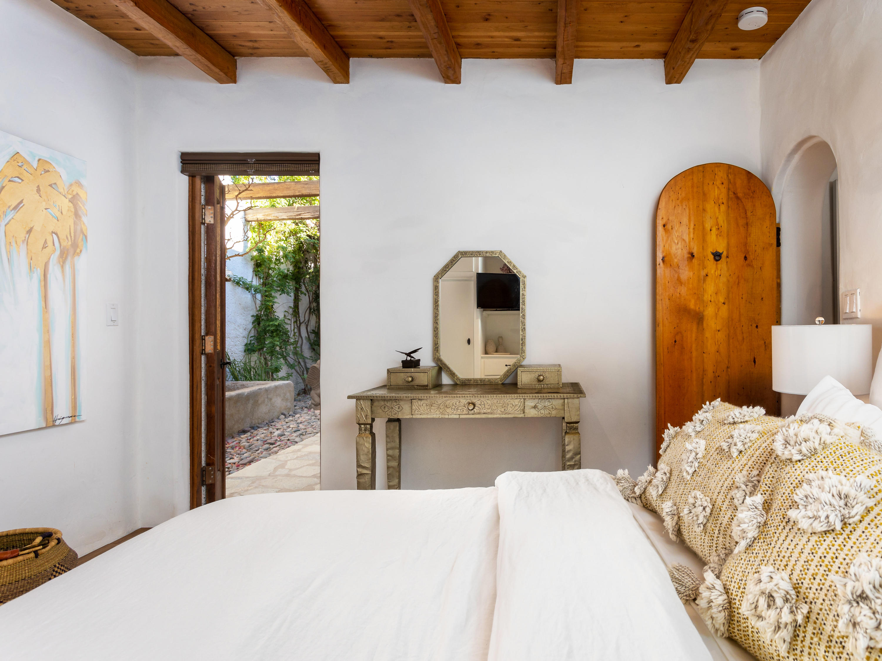 71607 Sahara Road Rancho Mirage, CA 92270 - Photo 25 of 40 a bedroom with bed and window