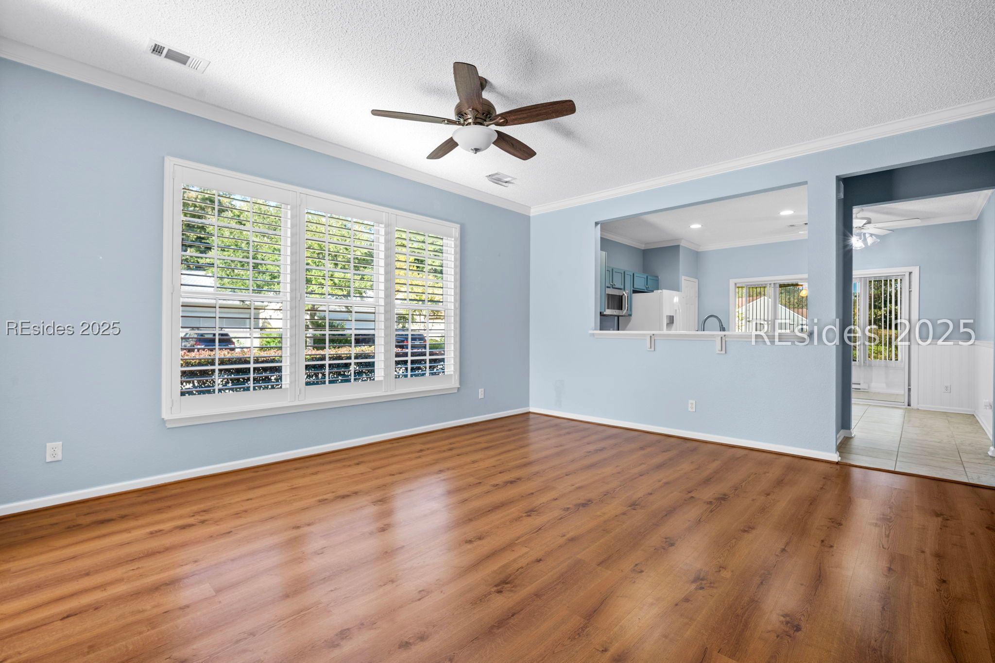 1 Nesting Lane Bluffton, SC 29909 - Photo 6 of 42 Great room with expansive windows and with shutter