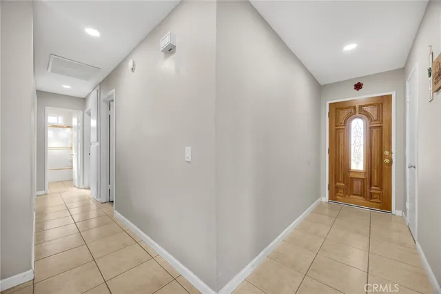 a view of hallway with a mirror