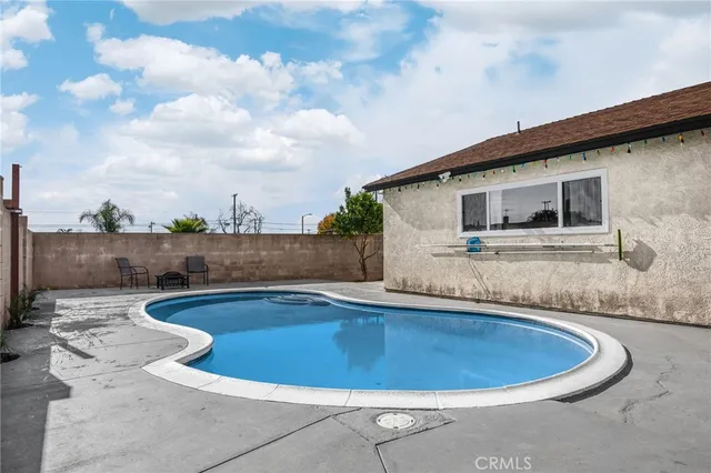 a view of outdoor space yard swimming pool and porch