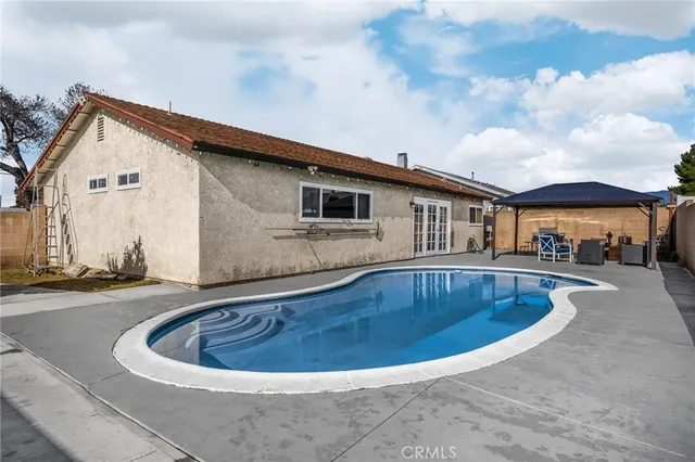 a view of outdoor space yard and swimming pool