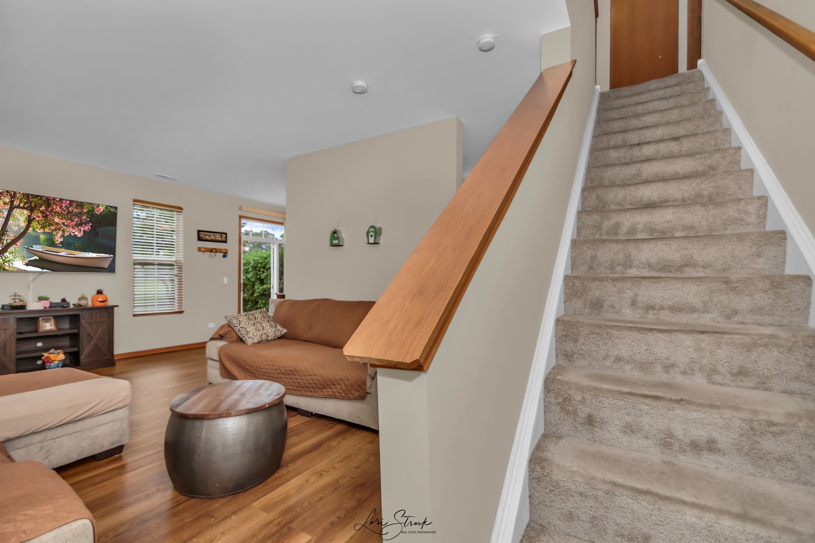 25009 Clare Circle Manhattan, IL 60442 - Photo 4 of 20 a living room with furniture and stairs