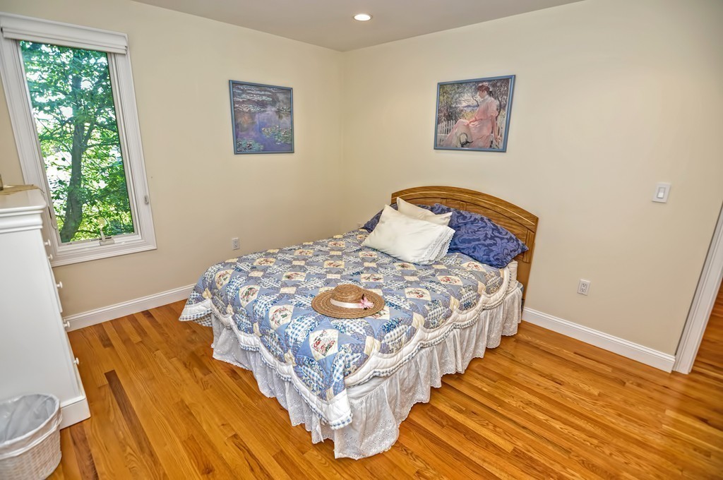 316 Hartman Road Newton, MA 02459 - Photo 21 of 30 a bedroom with a bed and a window