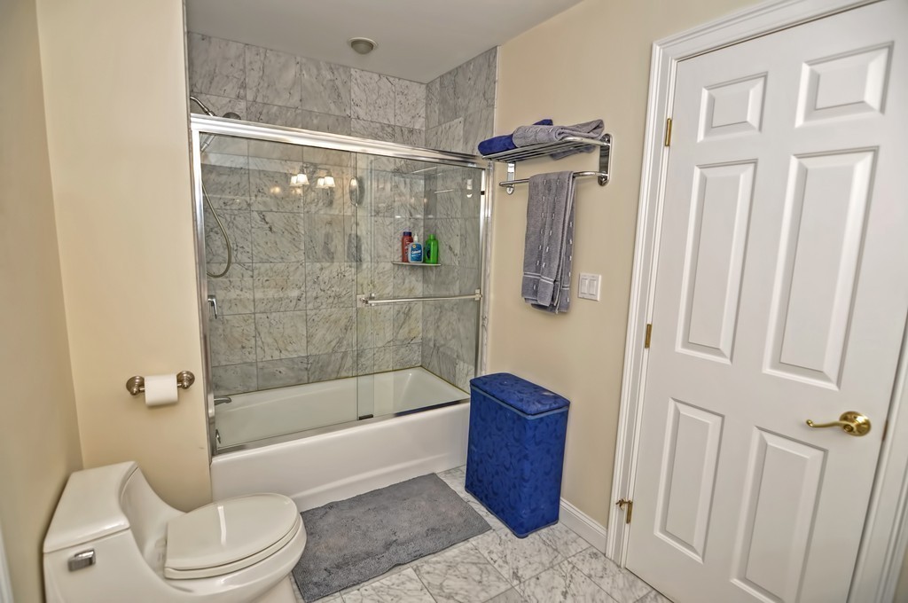 316 Hartman Road Newton, MA 02459 - Photo 23 of 30 a bathroom with a shower a toilet and bathtub