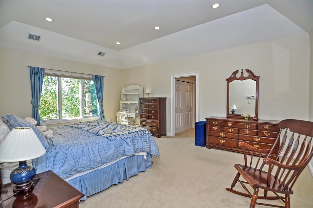 316 Hartman Road Newton, MA 02459 - Photo 26 of 30 a bedroom with a bed and wooden floor