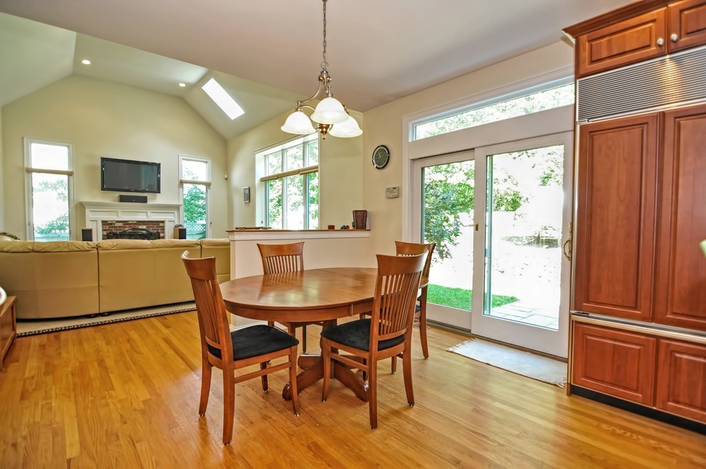 316 Hartman Road Newton, MA 02459 - Photo 7 of 30 a view of a dining room with furniture window and wooden floor