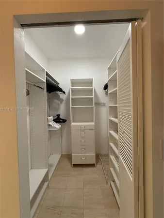 a view of a walk in closet