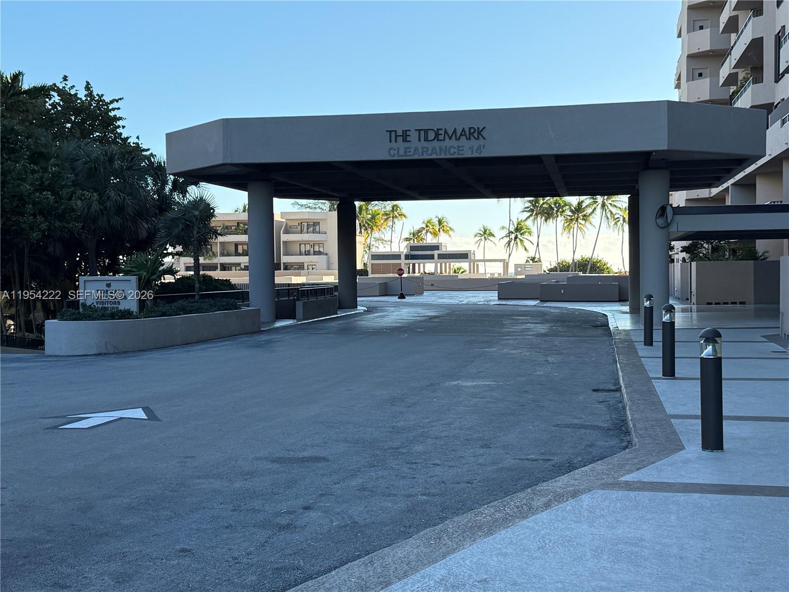 201 Crandon Boulevard, Unit 928 Key Biscayne, FL 33149 - Photo 26 of 38 a view of a porch with furniture and a yard