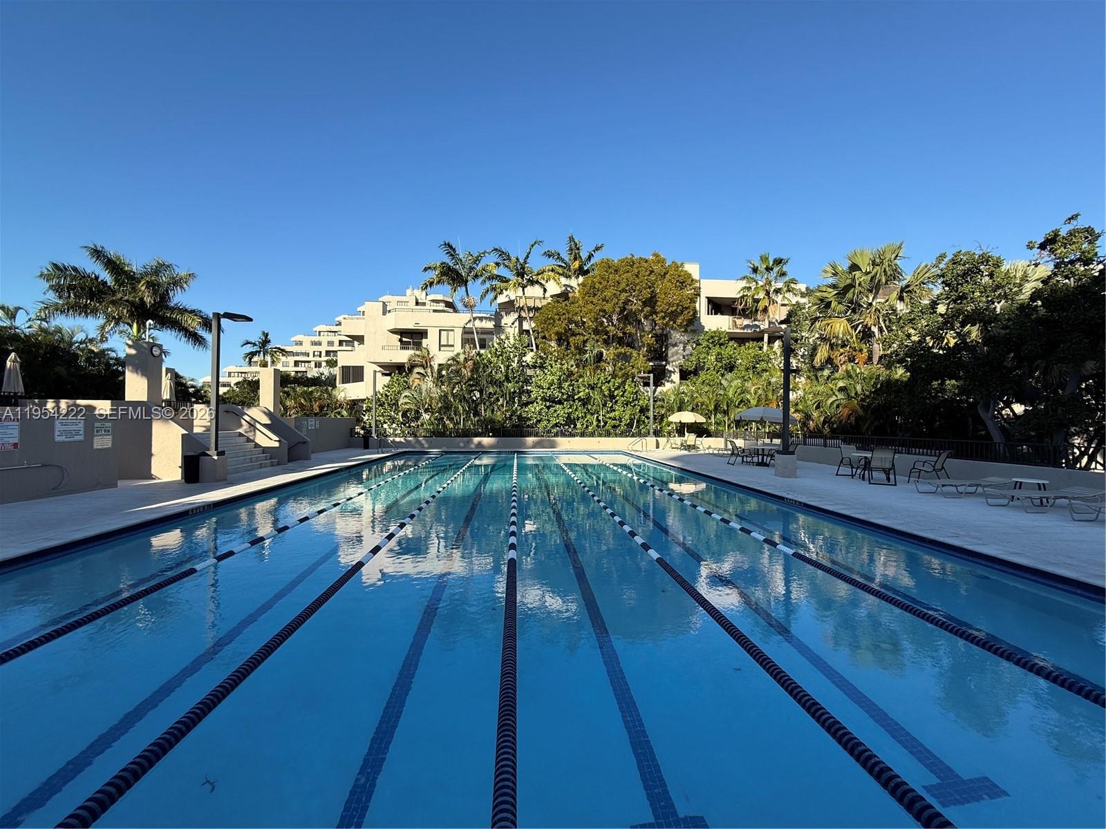 201 Crandon Boulevard, Unit 928 Key Biscayne, FL 33149 - Photo 31 of 38 a view of balcony and yard