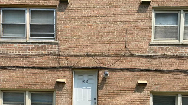 a brick house with a door