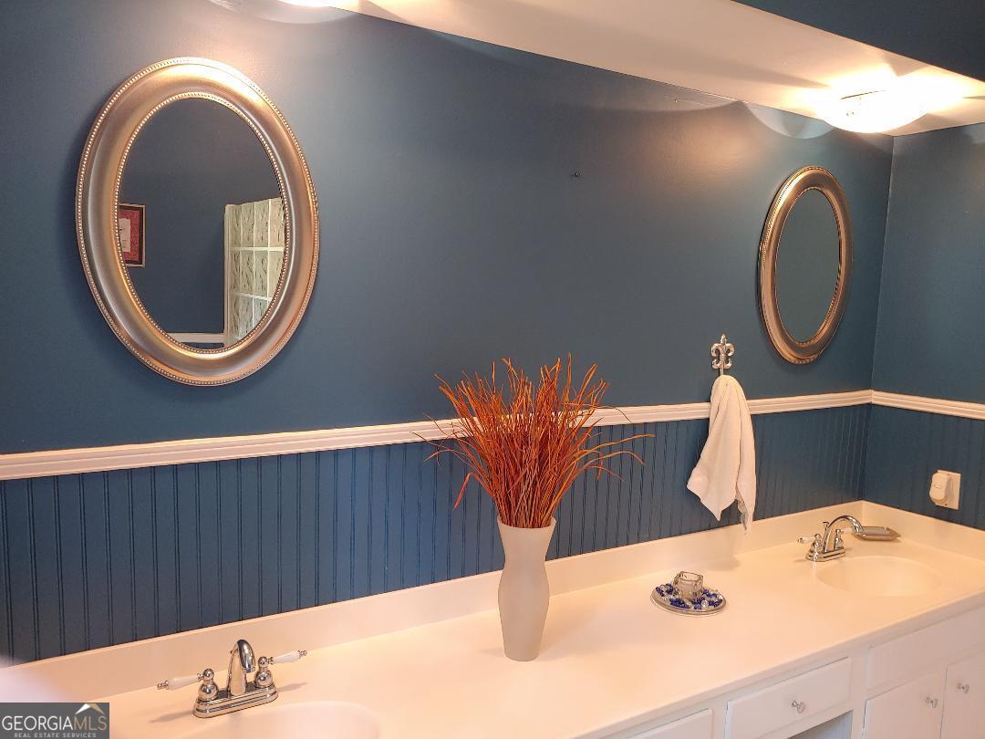428 Wesleyan Drive Macon, GA 31210 - Photo 16 of 26 a bathroom with a sink and a mirror