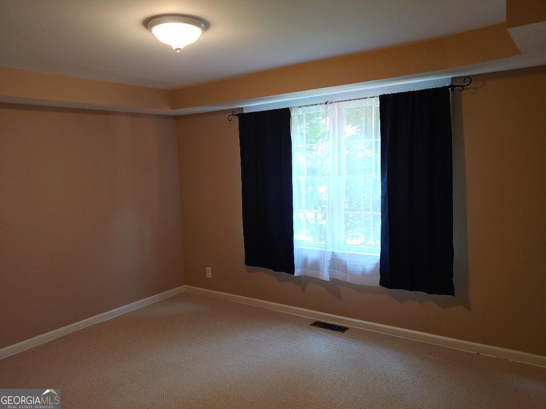 428 Wesleyan Drive Macon, GA 31210 - Photo 17 of 26 a view of an empty room with a window
