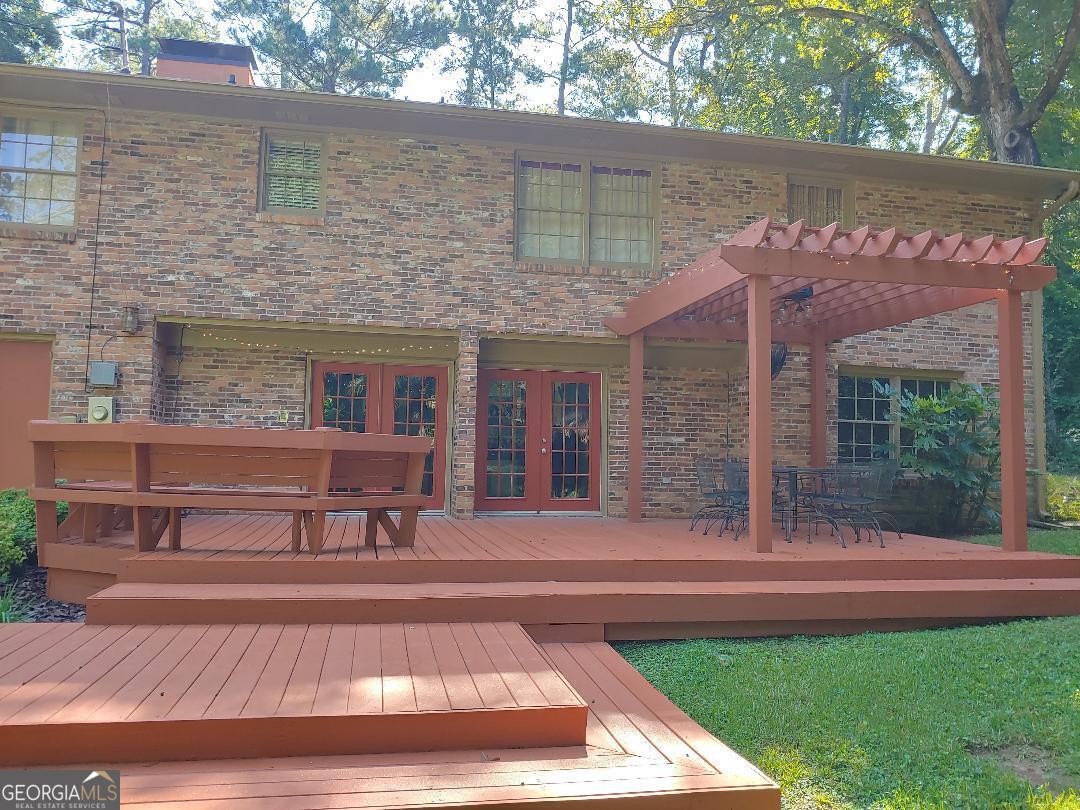 428 Wesleyan Drive Macon, GA 31210 - Photo 21 of 26 a view of a house with a yard and sitting area
