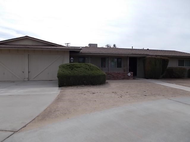 19469 Oneida Road Apple Valley, CA 92307 - Photo 1 of 1 a view of a car garage