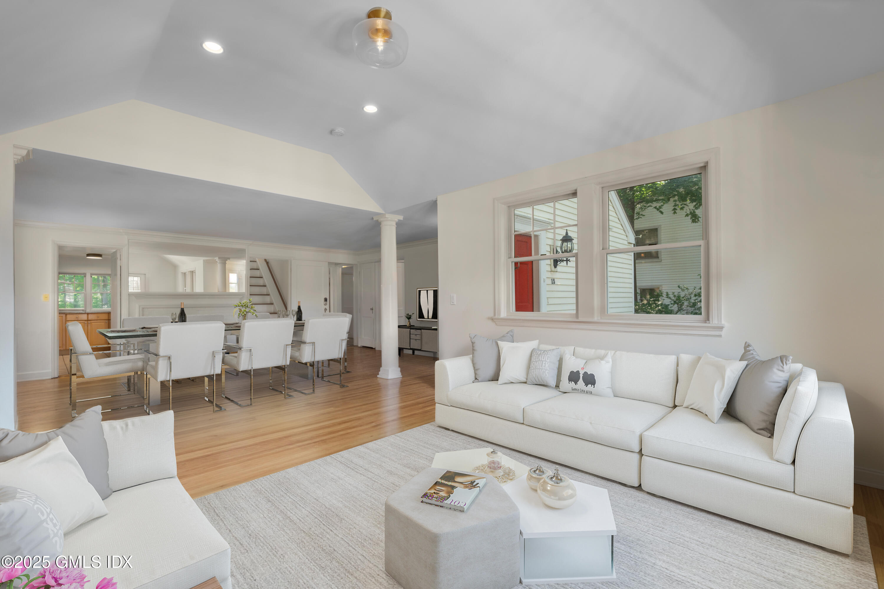 15 Ridge Road Cos Cob, CT 06807 - Photo 2 of 15 a living room with furniture and a large window