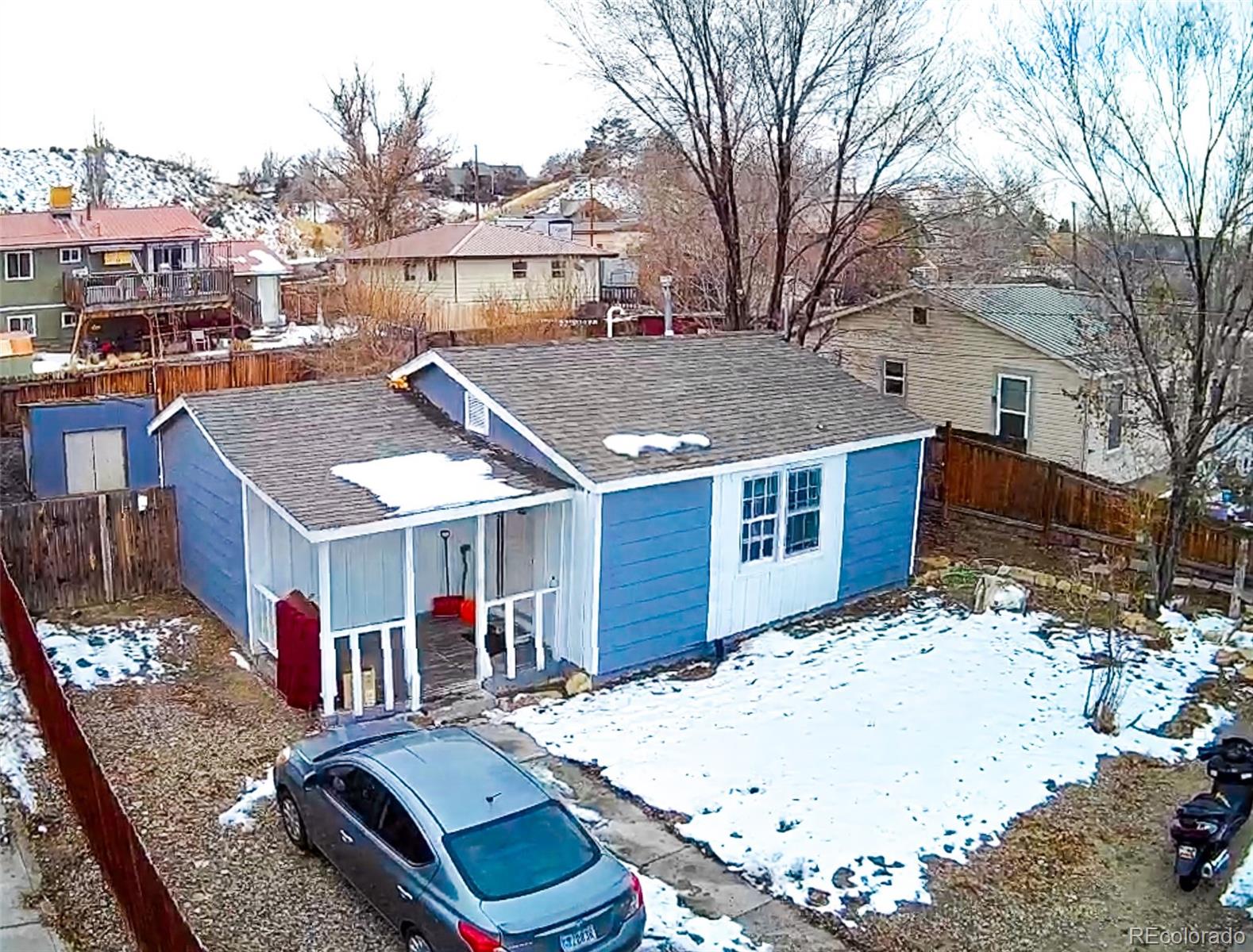 a aerial view of a house with a yard patio and backyard