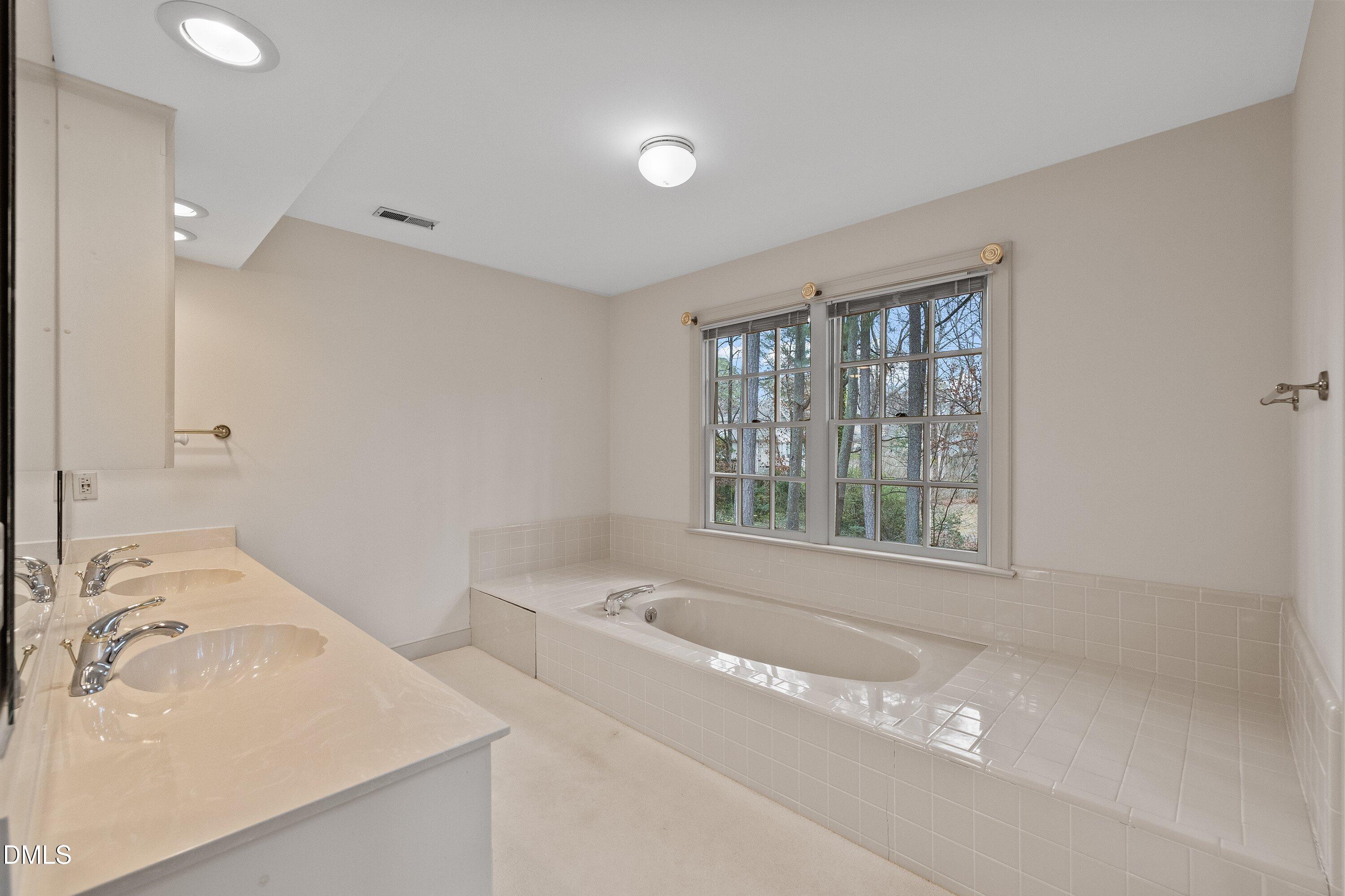1708 Sawgrass Court Raleigh, NC 27615 - Photo 36 of 60 Primary Bath