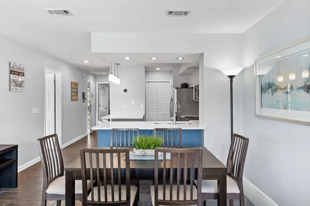 a view of a dining room and furniture