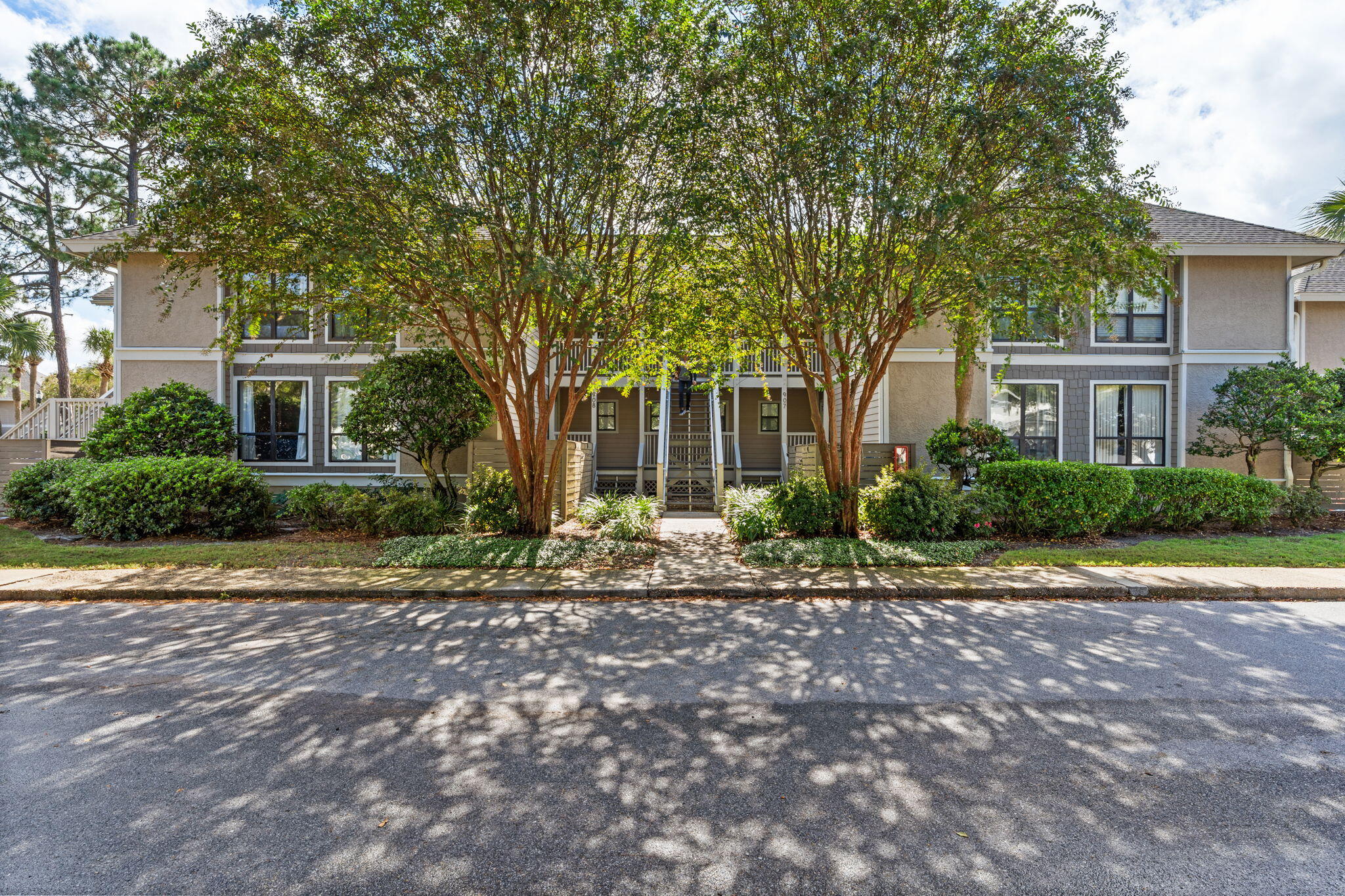 918 Harbour Point Lane, Unit 918 Miramar Beach, FL 32550 - Photo 31 of 43 a front view of a house with garden