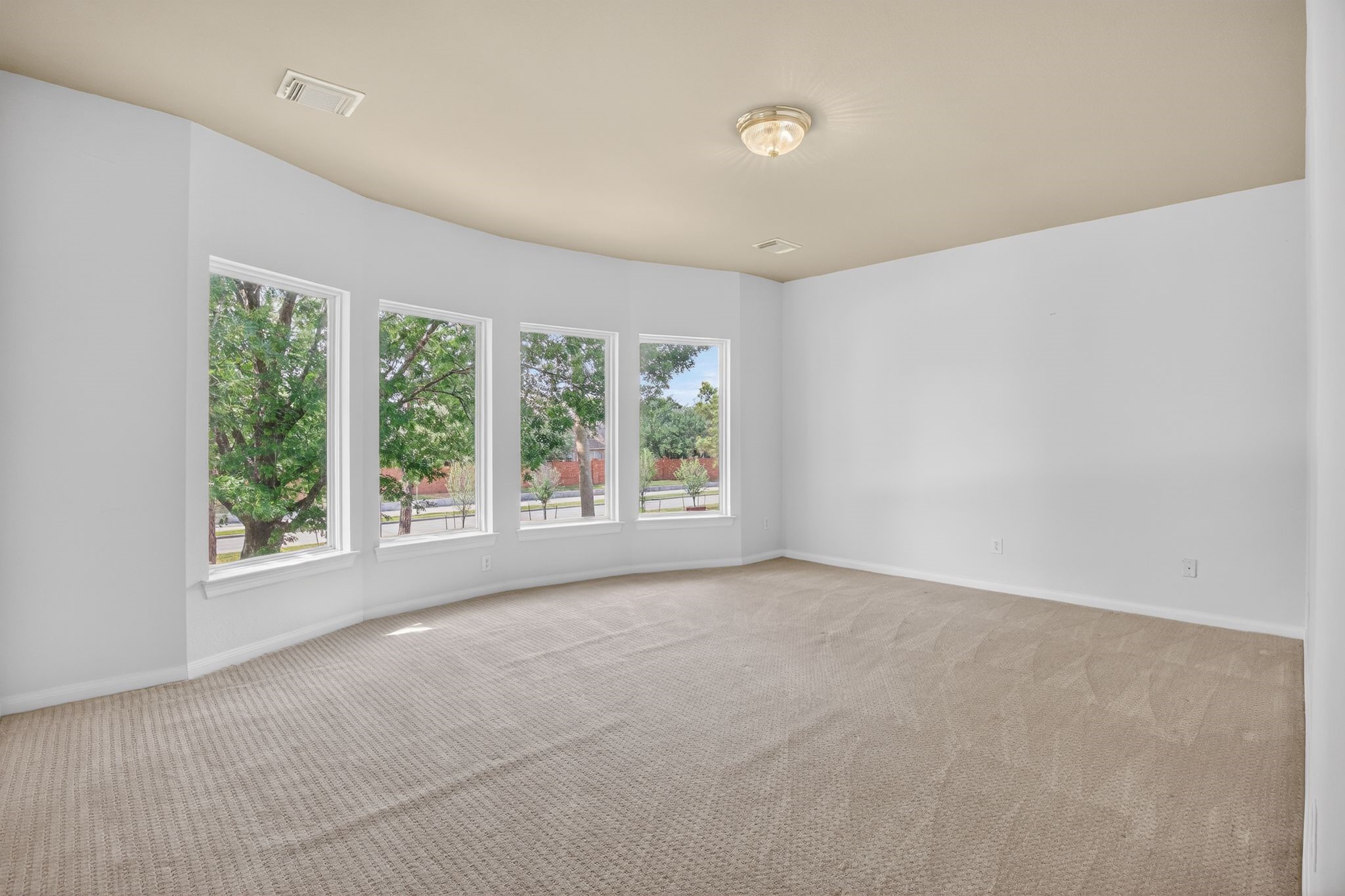 11511 Gallant Ridge Lane Houston, TX 77082 - Photo 33 of 49 a view of a big room with windows and chandelier fan