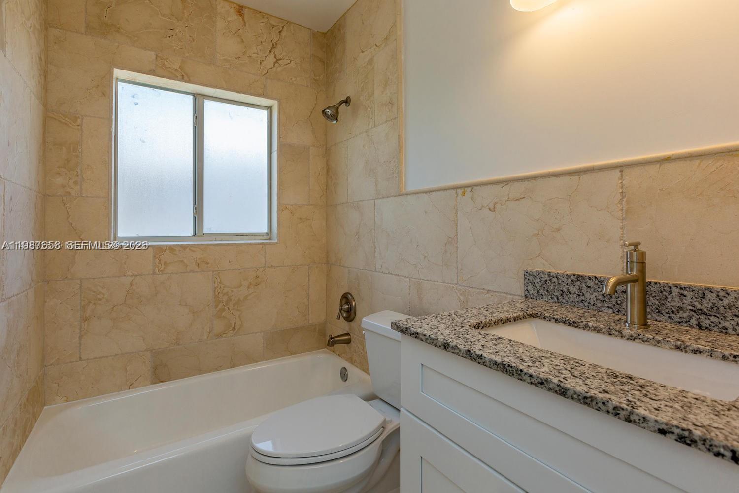 2882 South Le Jeune Road, Unit 2882 Coral Gables, FL 33134 - Photo 12 of 18 2nd bathroom with bathtub