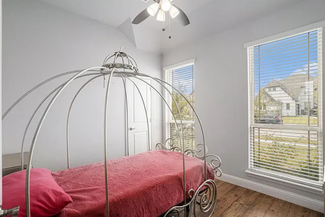 a bathroom with double sink and a mirror