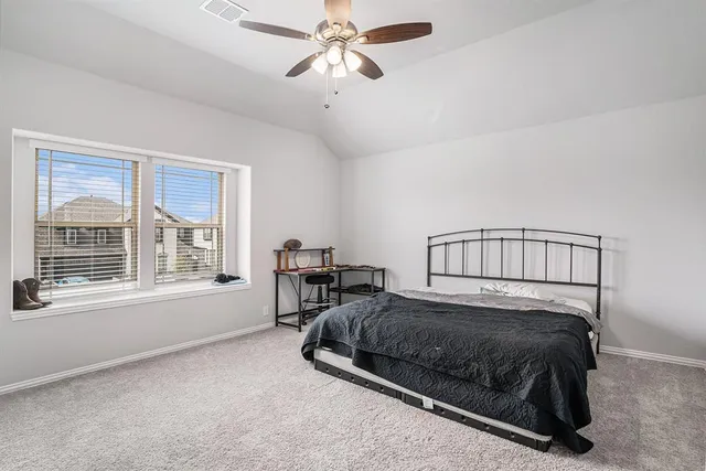 a bathroom with a sink vanity and a mirror