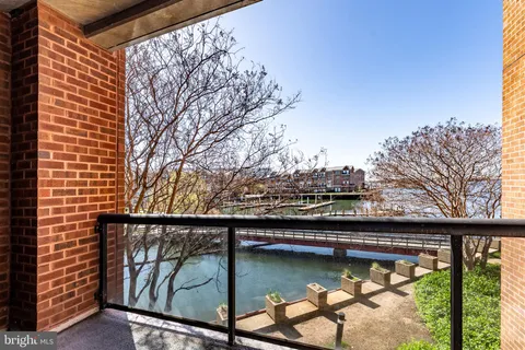 a view of swimming pool from a balcony