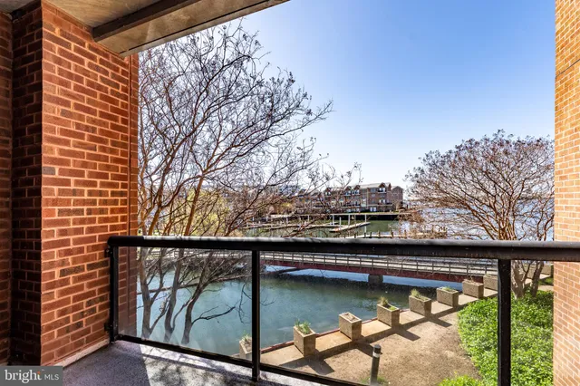 a view of swimming pool from a balcony