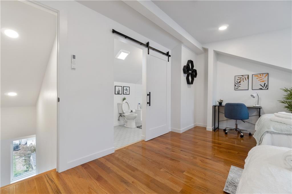 1240 Butterfield Way Pittsburgh, PA 15212 - Photo 31 of 35 a bedroom with a bed and furniture