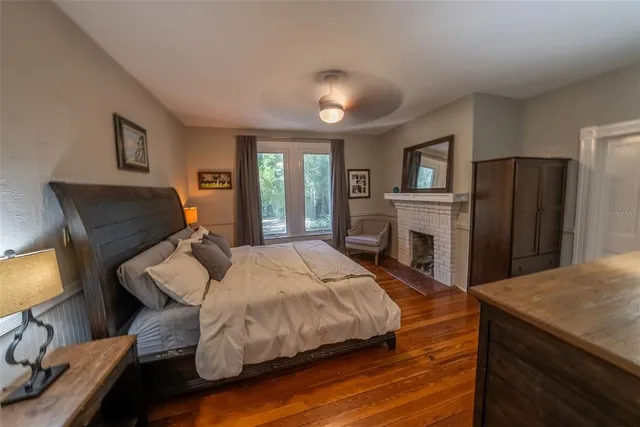 a kitchen with stainless steel appliances granite countertop a stove a refrigerator and a microwave