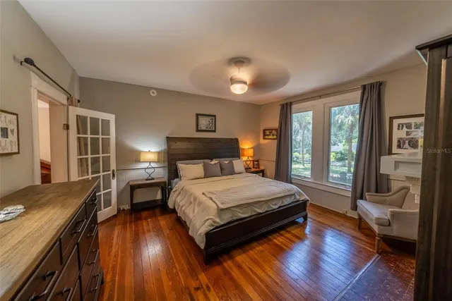 a kitchen with a sink a refrigerator and window