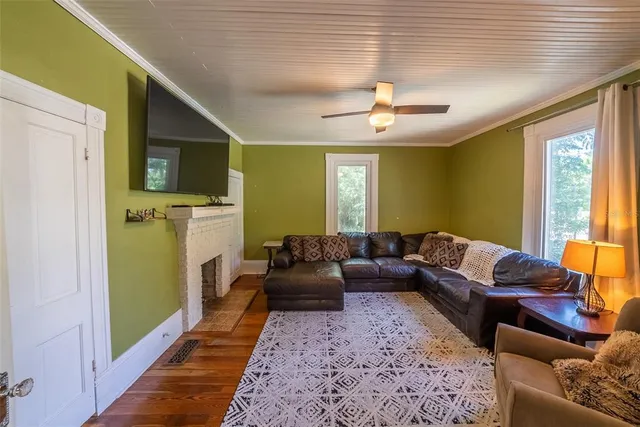 a living room with furniture and a window