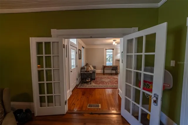 a view of a livingroom with furniture and workspace