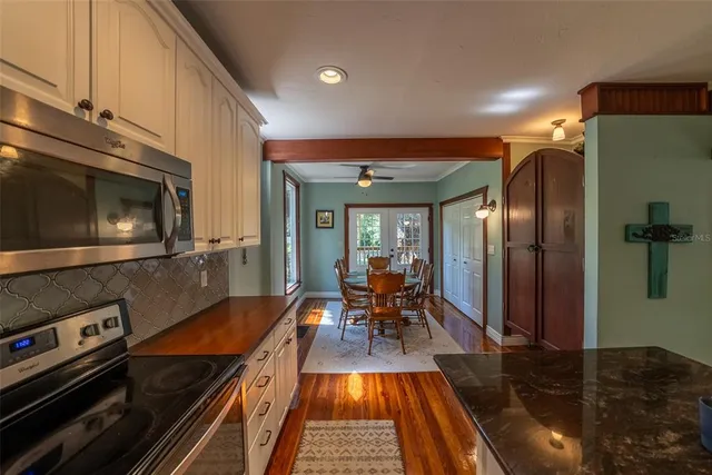 a backyard of a house with lots of green space