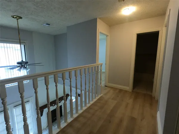 a view of hallway with stairs