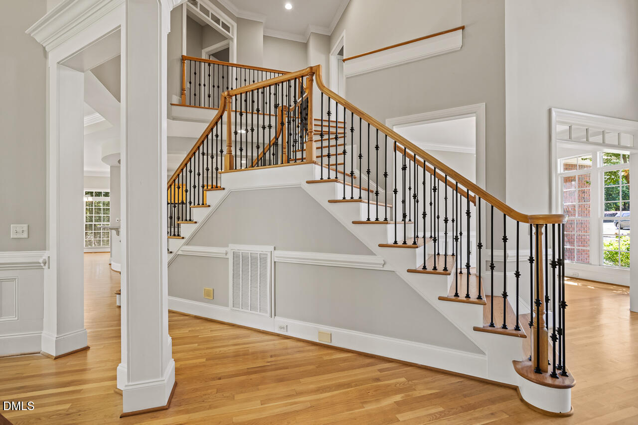 4004 Frontenac Court Apex, NC 27539 - Photo 13 of 61 a view of entryway and hall with wooden floor