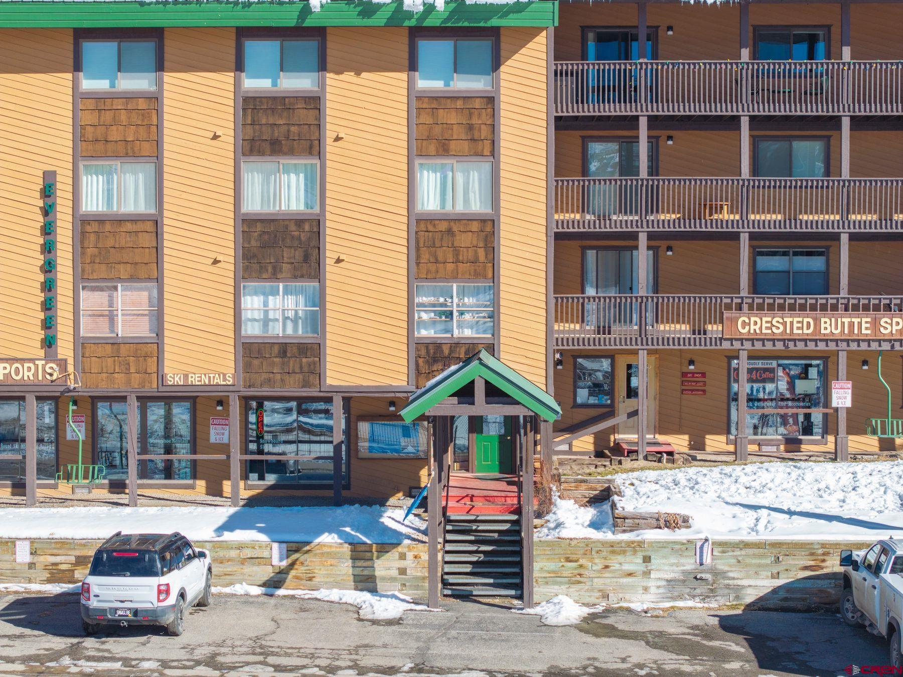 35 Emmons Road, Unit A Crested Butte, CO 81225 - Photo 26 of 28 a front view of a building with street