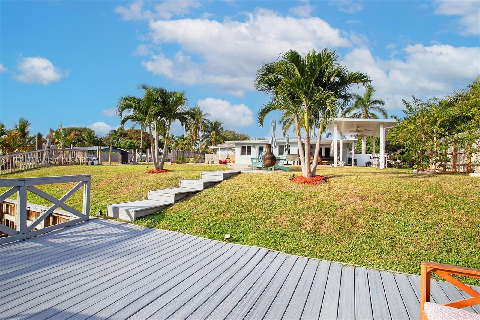 808 Mission Hill Road Boynton Beach, FL 33435 - Photo 44 of 68 a view of swimming pool with outdoor seating and wooden floor