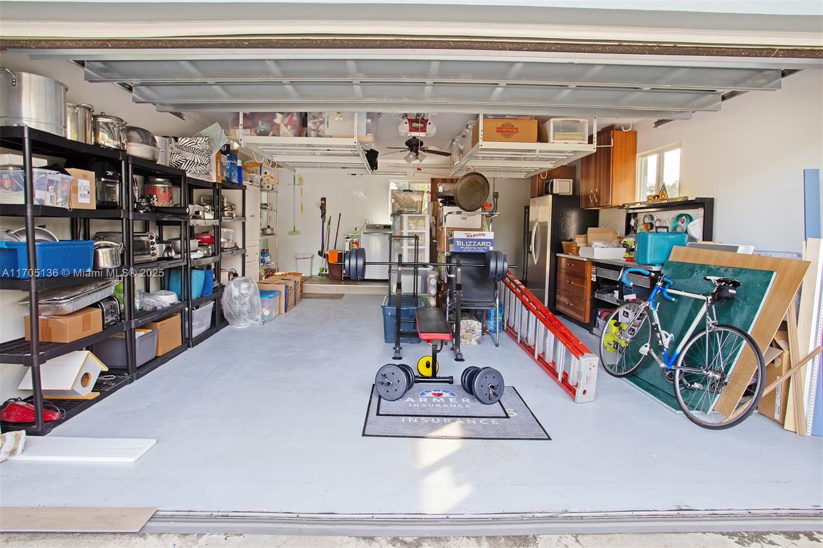 808 Mission Hill Road Boynton Beach, FL 33435 - Photo 49 of 68 a view of storage and utility room