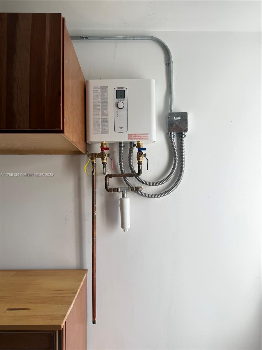 808 Mission Hill Road Boynton Beach, FL 33435 - Photo 52 of 68 New Tankless electric water heater