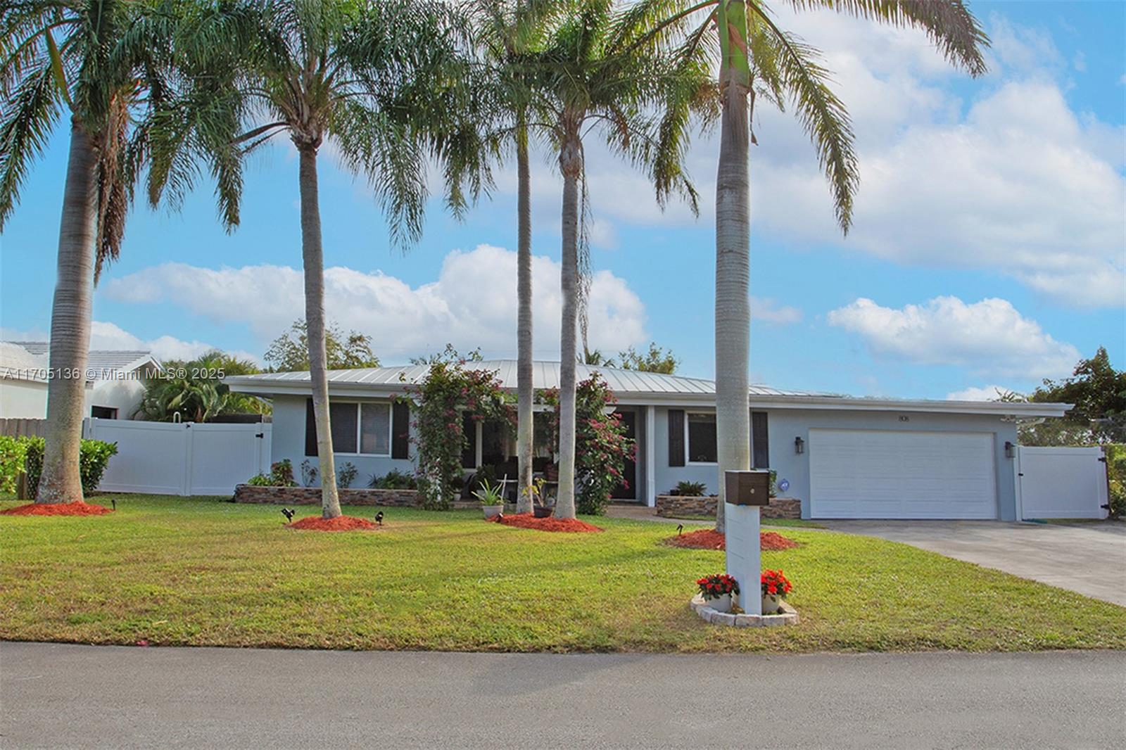 808 Mission Hill Road Boynton Beach, FL 33435 - Photo 9 of 68 a front view of house with yard and green space