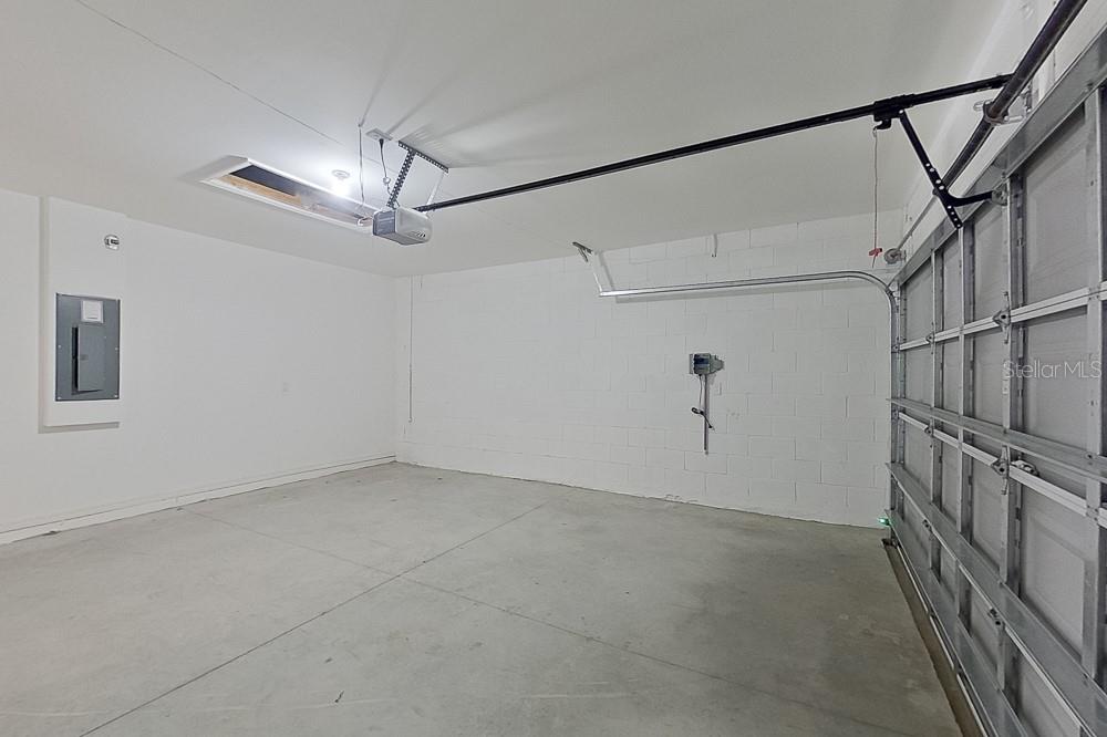 32044 Katelin Circle Leesburg, FL 34748 - Photo 18 of 20 a view of a garage