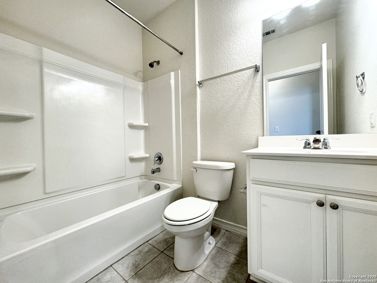 2858 Ridge Berry Road New Braunfels, TX 78130 - Photo 18 of 19 a bathroom with a toilet a sink and a bathtub