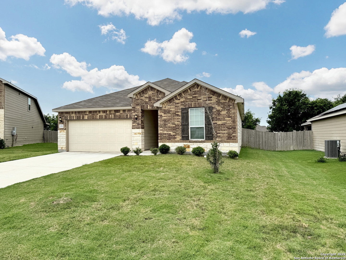 2858 Ridge Berry Road New Braunfels, TX 78130 - Photo 4 of 19 a front view of a house with garden